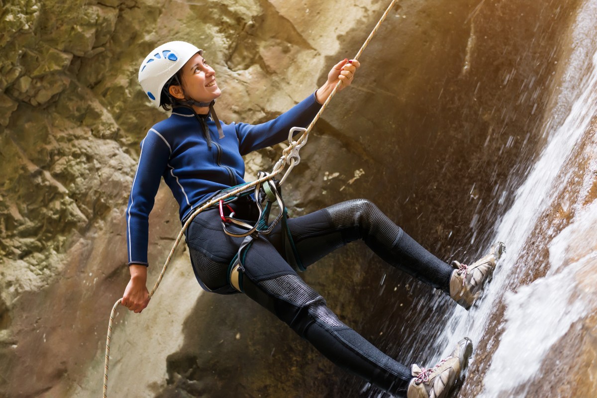 Female hiker climbing Female hiker climbing