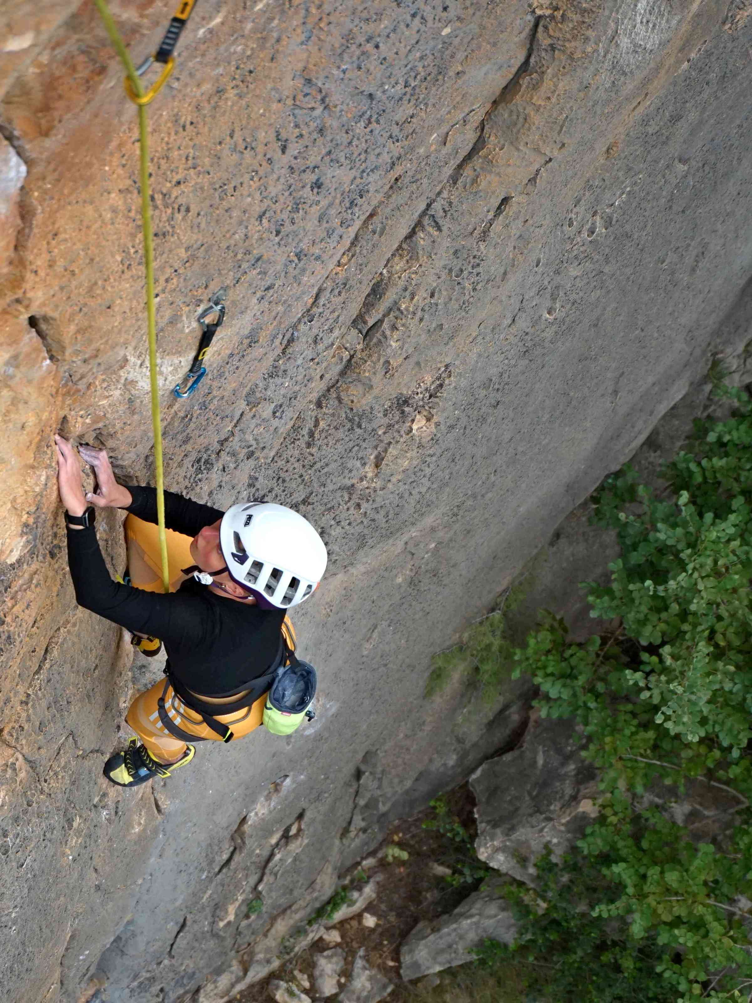 a man doing a trick on a rock