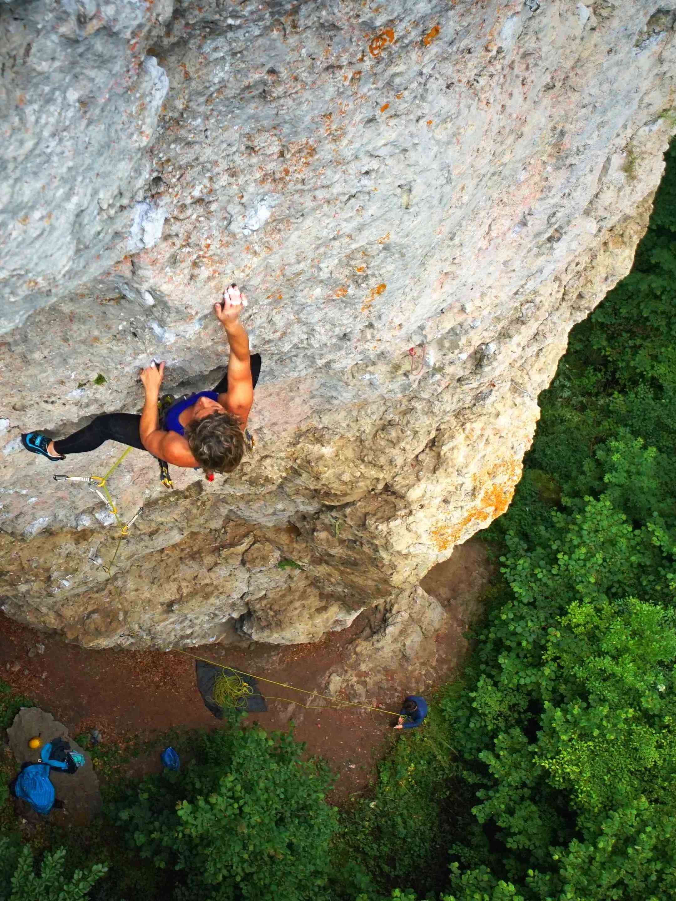 a man riding on top of a rock